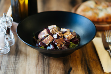 Beet salad on the old rustic table.