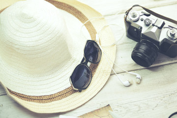 hat woman sunglasses and  camera