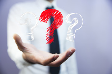 businessman hand  question mark