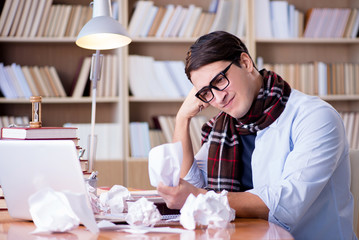 Young writer working in the library