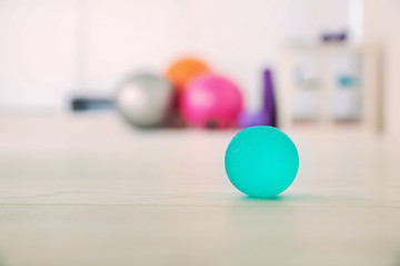 Stress ball on floor in clinic