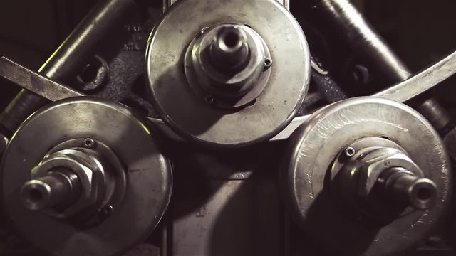 Metal processing machine. The process of announcing the metal pipe, reinforcement, profile on the metalworking machine at the steel foundry.