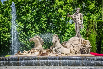 Papier Peint photo Fontaine Fountain of Neptune (Fuente de Neptuno) one of the most famous landmark of Madrid, Spain