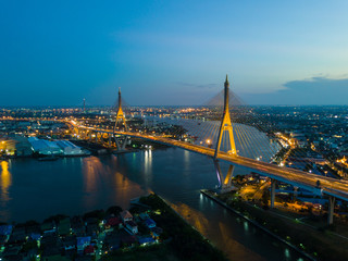 Beautiful sunset view from a drone of Bhumibol Bridge in Bangkok , Bridge of transportation for import , export , Bangkok ,Thailand