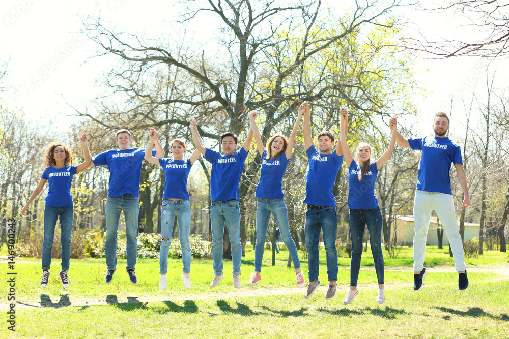 Sticker Group of volunteers in park on sunny day