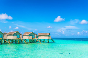 Beautiful water villas in tropical Maldives island  .