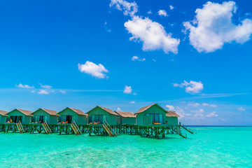 Beautiful water villas in tropical Maldives island  .