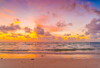 Naklejka na ściany i meble Beautiful sunset with sky over calm sea in tropical Maldives island .