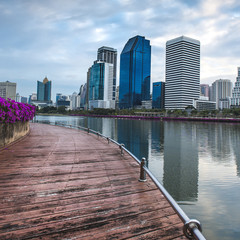 The landscape urban park with water and buildings.