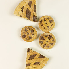 Tart with chocolate cream on white background - top view