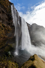 Seljalandsfoss is one of the best known and most popular waterfalls in Iceland. It is a part of the Seljalands River that originates in the  volcanic glacier Eyjafjallajokull.