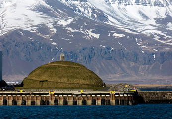 Landscape sculpture called Thufa which translates into 'Mound' or 'Tussock', created by the visual artist Olof Nordal in Reykjavik's harbor in 2013.