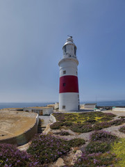 Fototapeta na wymiar view of the Trinity Lighthouse at Europa Point, in Gibraltar, and the Mediterranean sea
