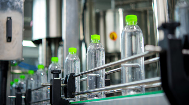 Conveyor with water bottles