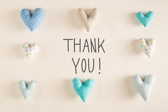 Thank You message with blue heart cushions