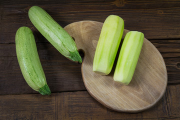 Organic zucchini on the wooden board