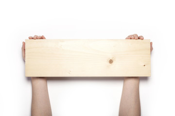 woman hand hold a wood board isolated white.
