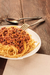 Plate of pasta with meat and tomato sauce