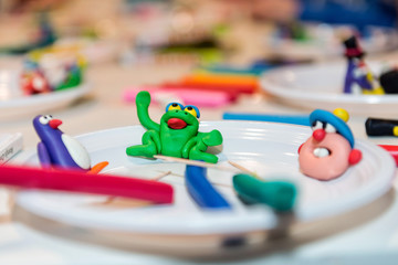 Ideas for children's creativity. Colored figures from plasticine.