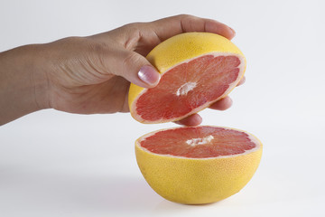 Holding a grapefruit
