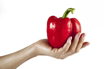 Holding a red bell pepper