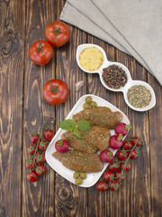 Chicken fillet in marinade on a wooden board. 