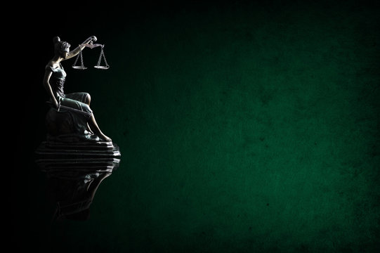 Lady Justice on emerald background