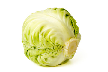 Green cabbage on a white