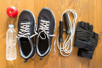 Male sports kit with red apple