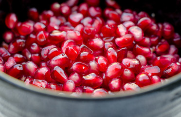 Bowl filled with fresh pomegranate seeds