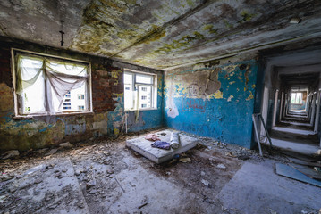 Fototapeta na wymiar Interior of abandoned hospital in former Soviet military town Skrunda-1 in Latvia