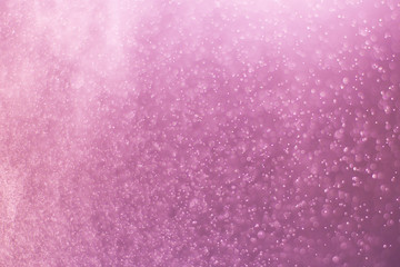 abstract of pink light particle and glitter bokeh.