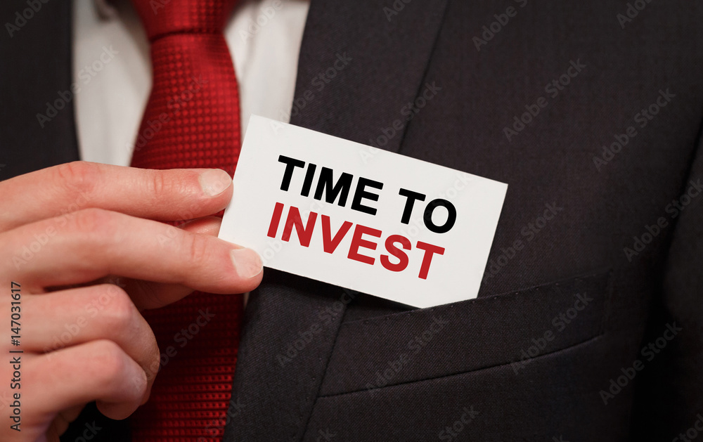 Poster businessman putting a card with text time to invent in the pocket