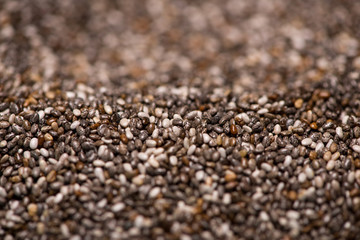 Close-up of raw, unprocessed, dried black chia seeds