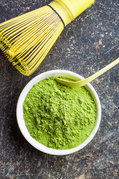 Green matcha tea powder.