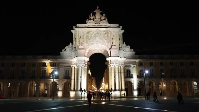 Night view video of triumphal  Rua Augusta Arch seen from Commerce Square in Lisbon, Portugal
