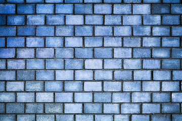 Brick wall of blue color, the texture of the stone surface