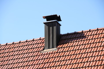 Kamin auf dem Dach