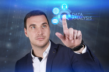 Business, Technology, Internet and network concept. Young businessman working on a virtual screen of the future and sees the inscription: Data analysis