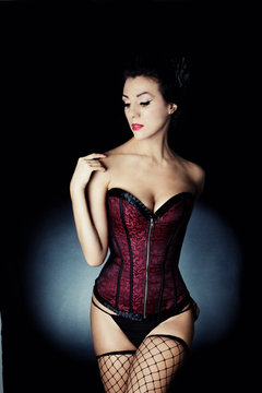 Actress in red corset 