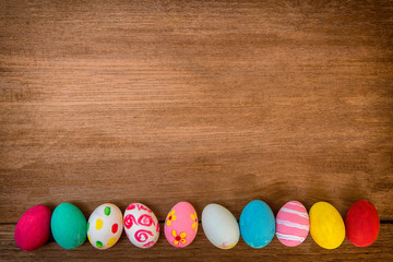 Easter eggs and in green grass. Festive decoration.