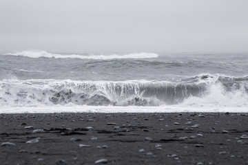 Waves in the beautiful volcanic black sand beach in Dyrholaey near Vik, Iceland.  