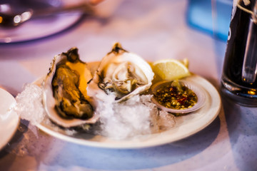 Fresh oysters with a spicy chili seafood sauce