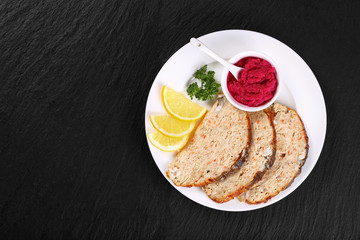 Gefilte minced carp fillets with horseradish sauce