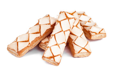 Delicious puff pastry on white background