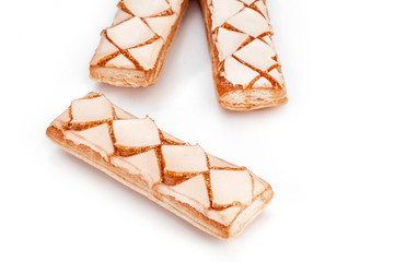 Puff pastry isolated on white background.