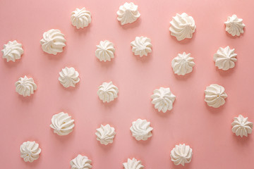 Marshmallow - zephyr pattern on a pink background.