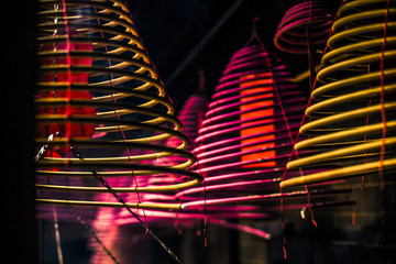 Burning incense coils