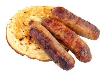 Grilled Pork Sausages On A Buttered Crumpet