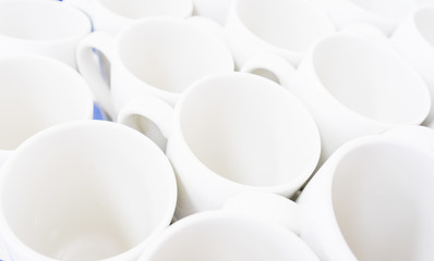 Clean white cups for tea prepared for the celebration. Catering for events and celebrations.